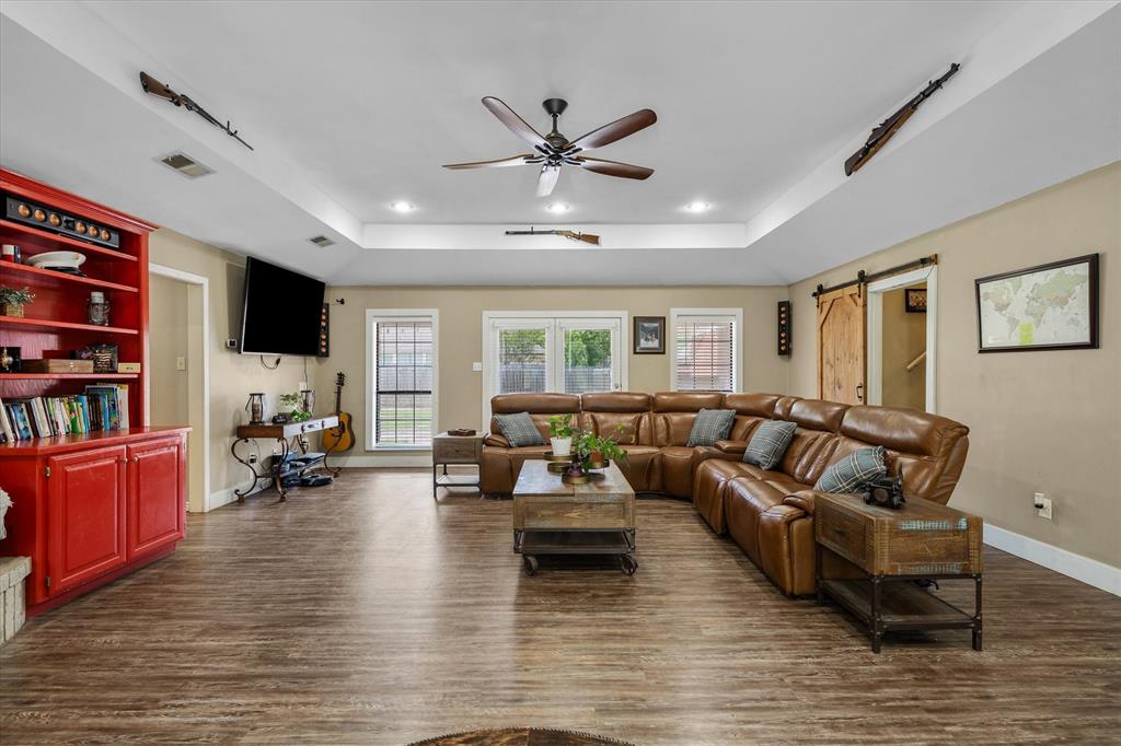 163 Granada Square Canton, TX 75103 - Photo 5 of 39 Open great room is the central hub of the home.