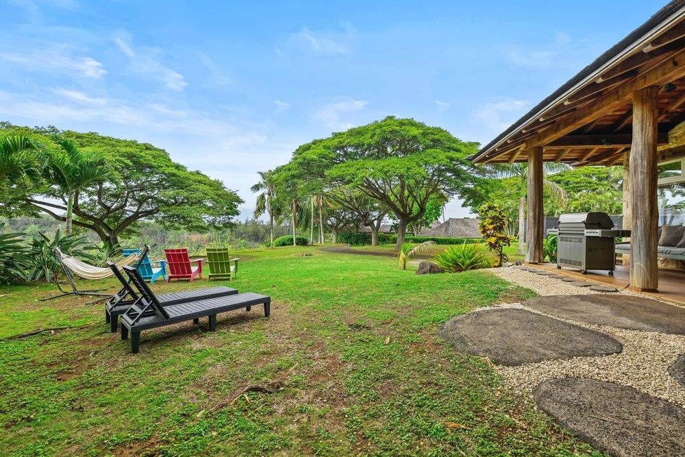 160 A Piialii Place Haiku, HI 96708 - Photo 20 of 22 a bench is sitting in the grass