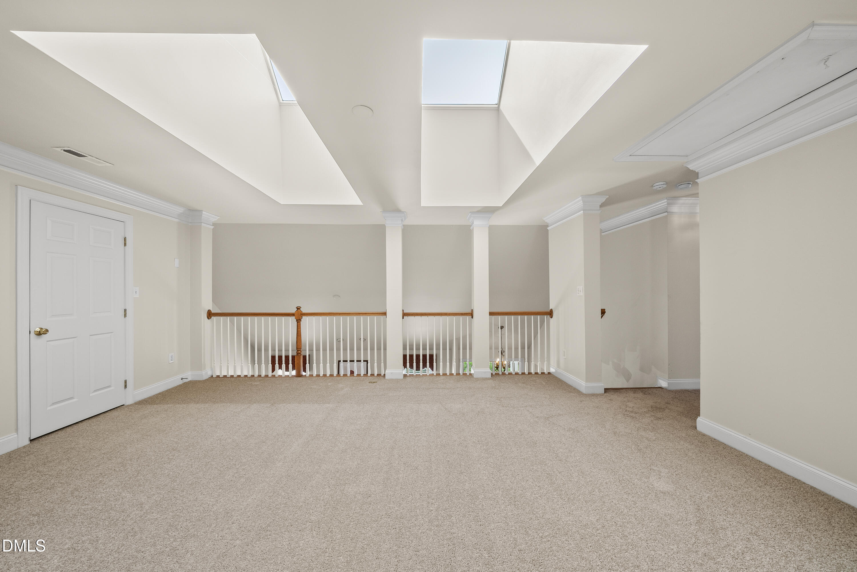 9125 White Eagle Court Raleigh, NC 27617 - Photo 29 of 44 a view of an empty room with wooden floor