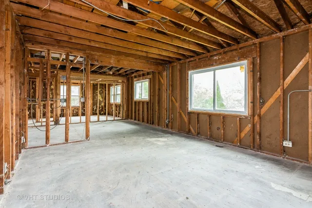a view of a room with wooden walls