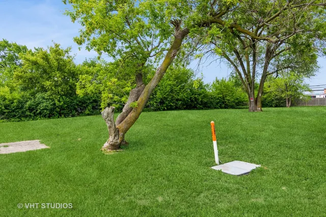 a view of a golf course with a park