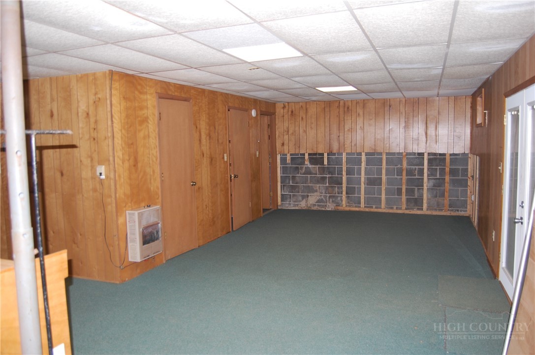 61 Dew Drop Loop Newland, NC 28657 - Photo 15 of 26 a view of an empty room with a window