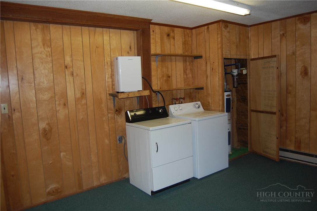 61 Dew Drop Loop Newland, NC 28657 - Photo 16 of 26 a room with a bed furniture and a window