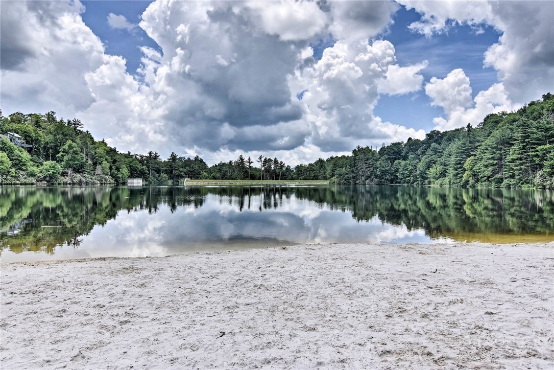 61 Dew Drop Loop Newland, NC 28657 - Photo 20 of 26 a view of a lake with houses in the background