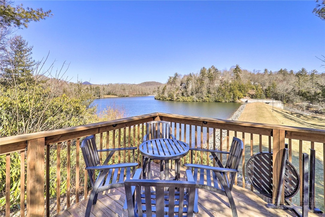 61 Dew Drop Loop Newland, NC 28657 - Photo 21 of 26 a view of a balcony with furniture