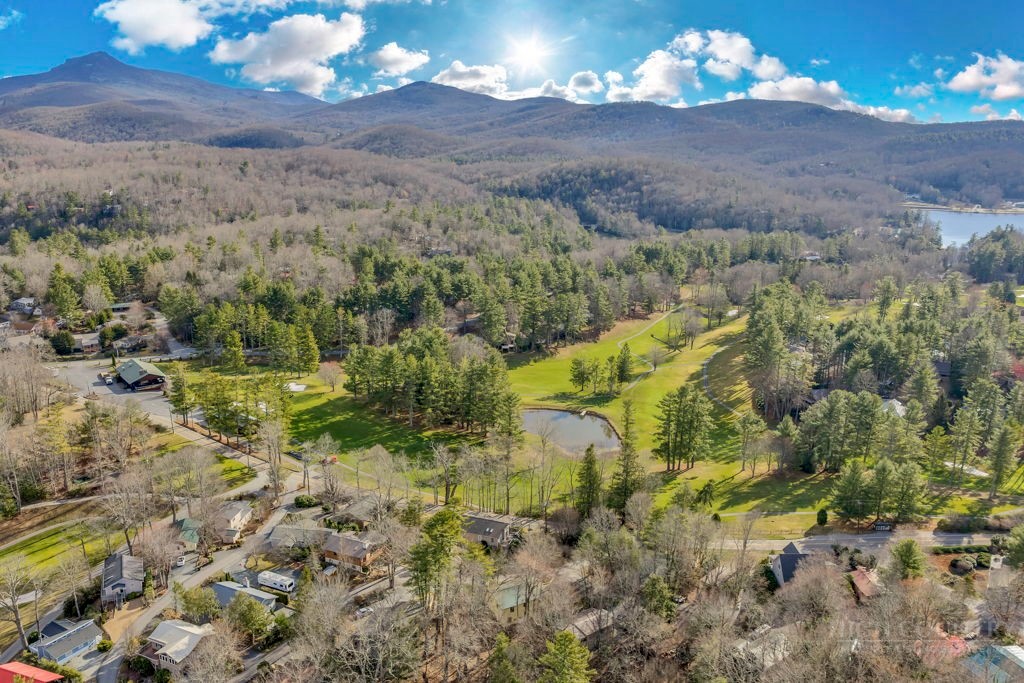 61 Dew Drop Loop Newland, NC 28657 - Photo 24 of 26 a view of a houses with a yard