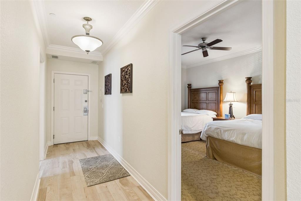 7650 Whisper Way, Unit 204 Reunion, FL 34747 - Photo 4 of 29 a room with a bed and furniture