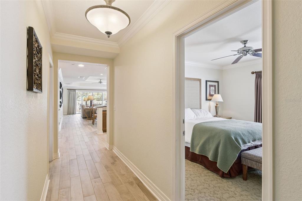 7650 Whisper Way, Unit 204 Reunion, FL 34747 - Photo 5 of 29 a view of a bedroom from a hallway