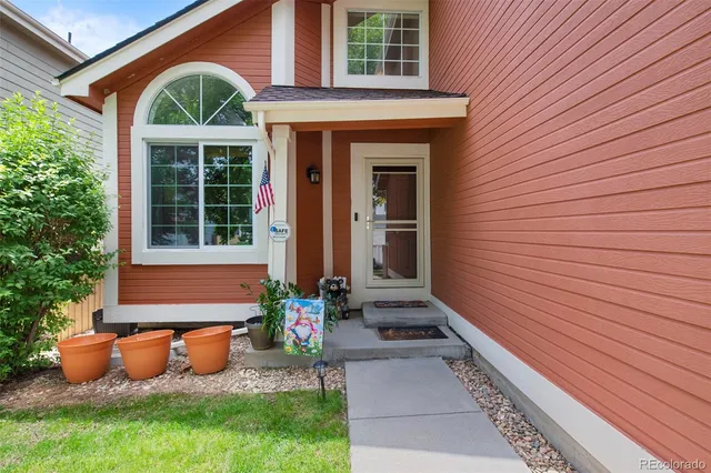 a front view of a house with patio