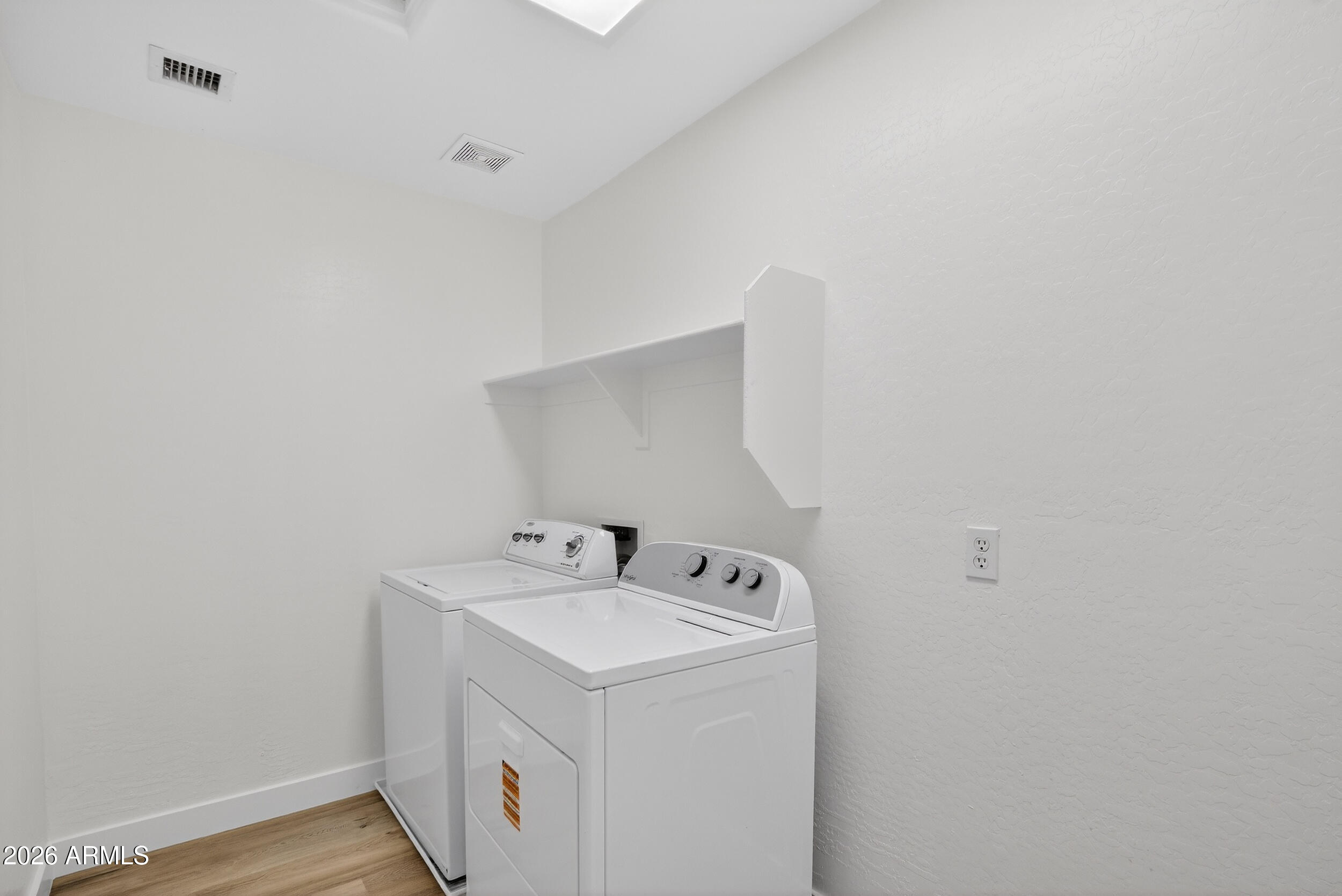 43620 West Cowpath Road Maricopa, AZ 85138 - Photo 52 of 60 a utility room with dryer and washer