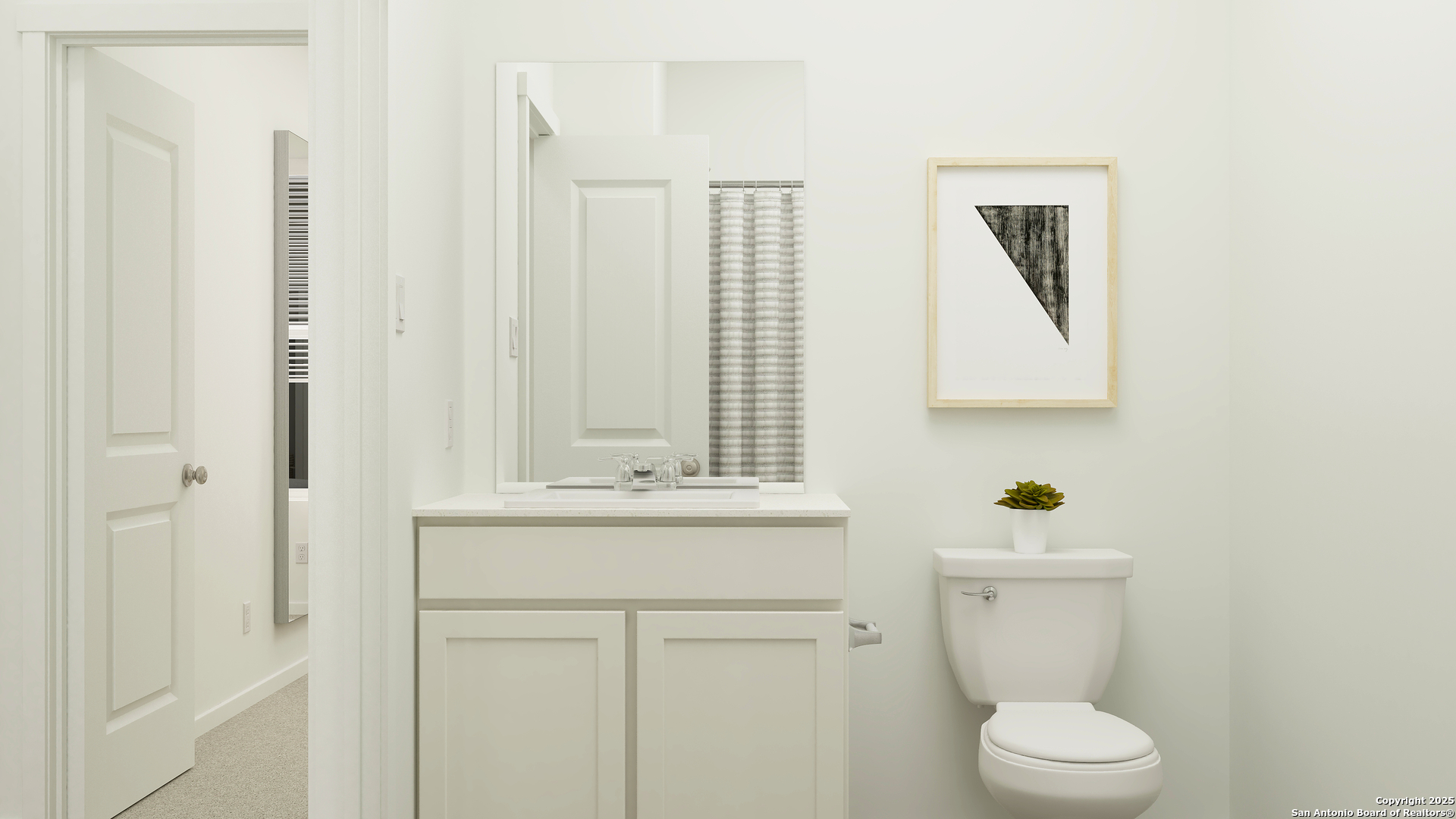 156 Rawhide Ridge Pleasanton, TX 78064 - Photo 17 of 26 a bathroom with a sink a toilet and mirror