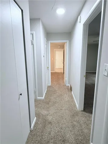 a view of a room with racks on the wall