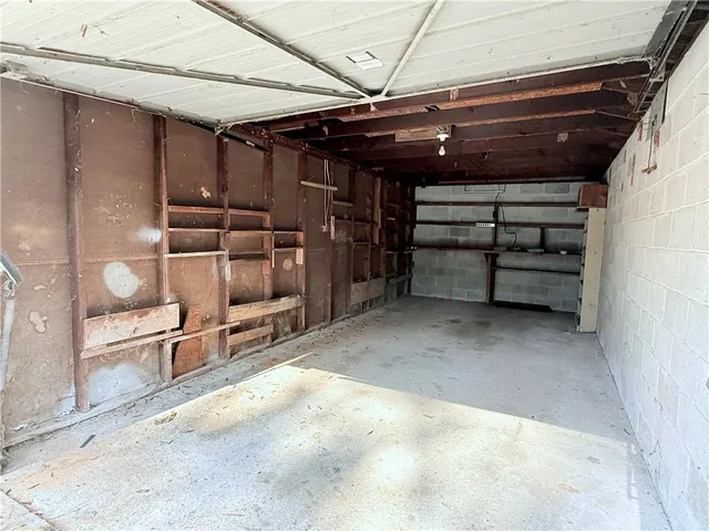 a view of swimming pool with an outdoor space and seating area