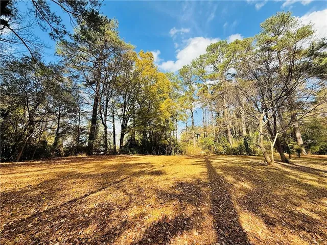 an aerial view of house with yard