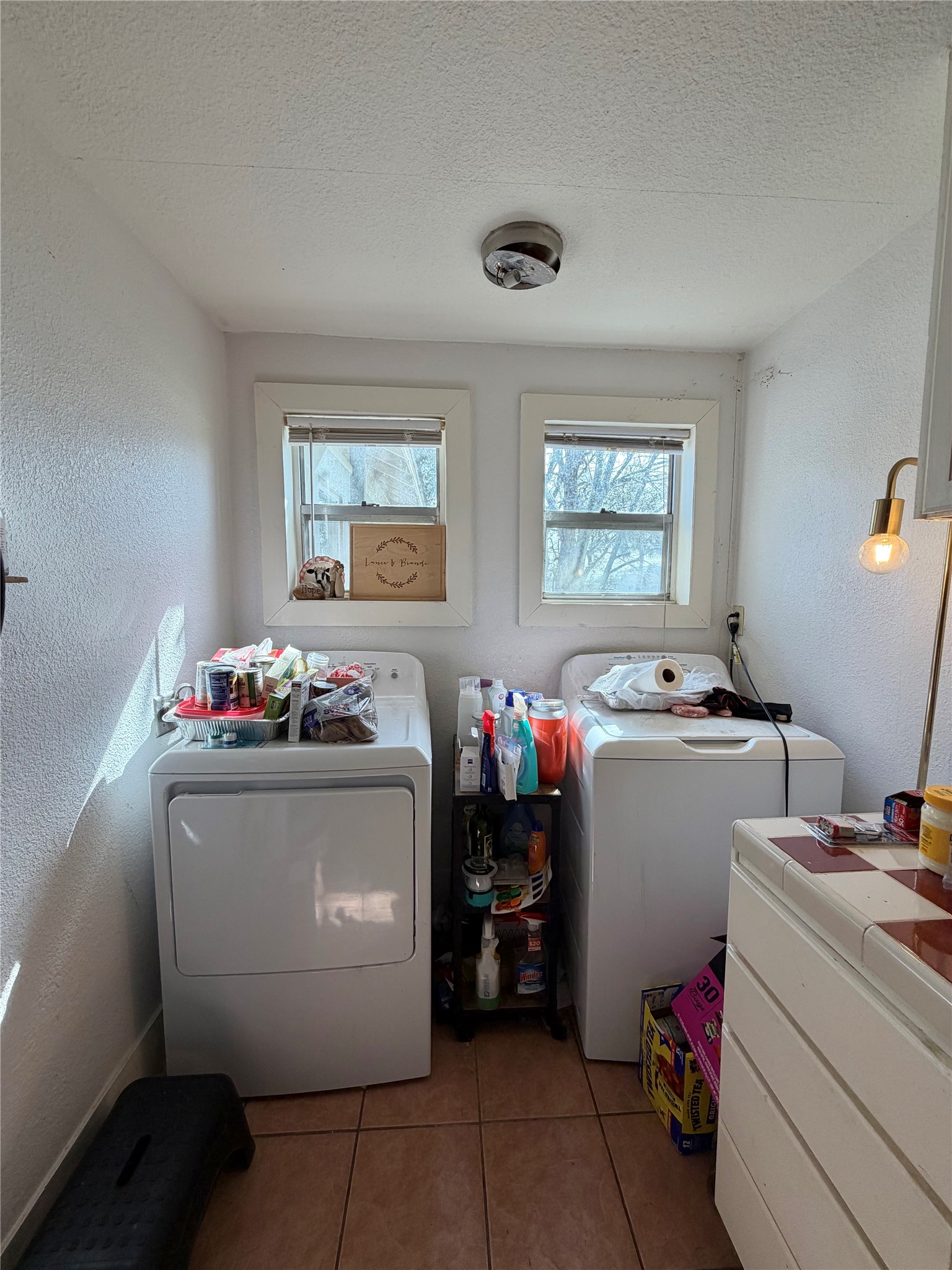 326 West 2nd Street Freeport, TX 77541 - Photo 13 of 24 a room with storage and utility