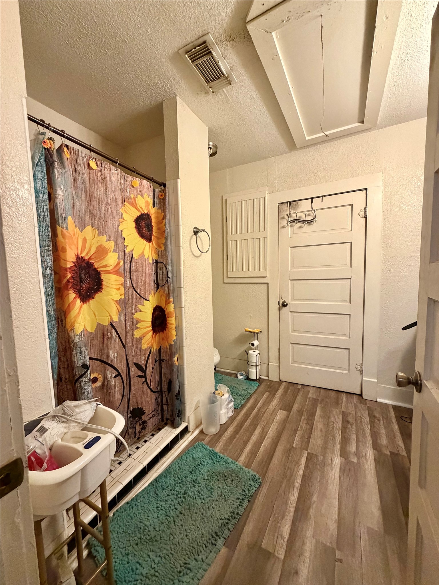 326 West 2nd Street Freeport, TX 77541 - Photo 15 of 24 a bedroom with a bed and a window