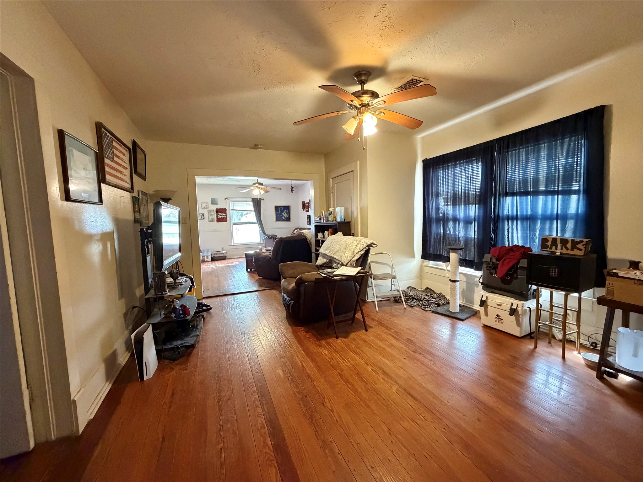 326 West 2nd Street Freeport, TX 77541 - Photo 9 of 24 a living room with furniture and a large window