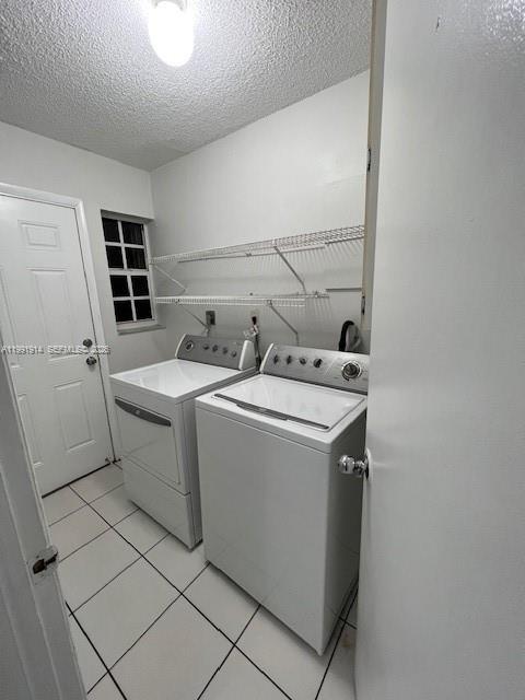 5580 Northwest 3rd Street, Unit 5580 Miami, FL 33126 - Photo 3 of 10 a utility room with dryer and washer