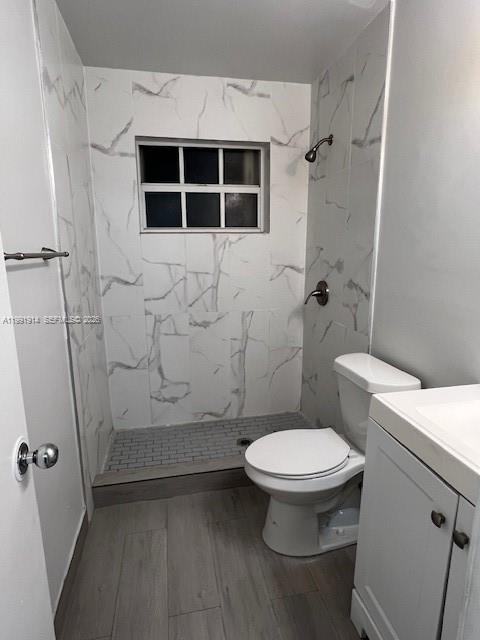 5580 Northwest 3rd Street, Unit 5580 Miami, FL 33126 - Photo 6 of 10 a bathroom with a toilet and a shower