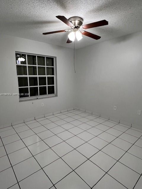 5580 Northwest 3rd Street, Unit 5580 Miami, FL 33126 - Photo 8 of 10 a view of a room with a ceiling fan and window