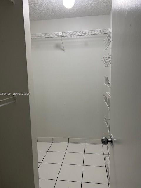 5580 Northwest 3rd Street, Unit 5580 Miami, FL 33126 - Photo 9 of 10 a view of small space with racks on the wall