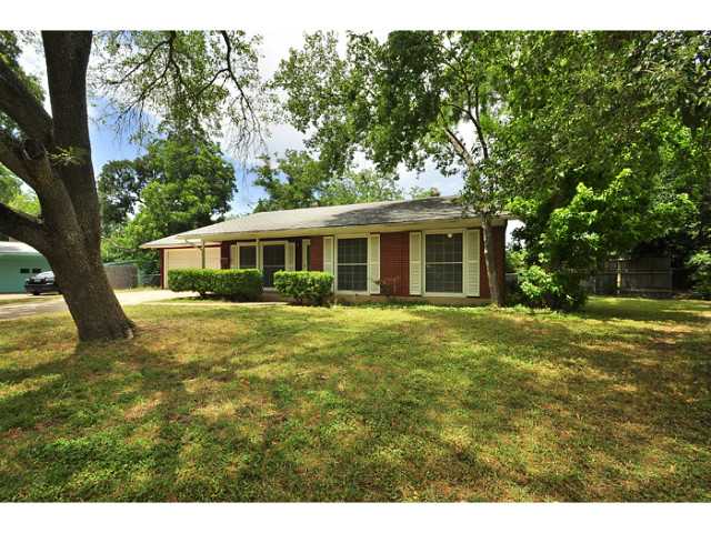 a house view with a garden space