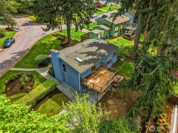 an aerial view of a house with a garden