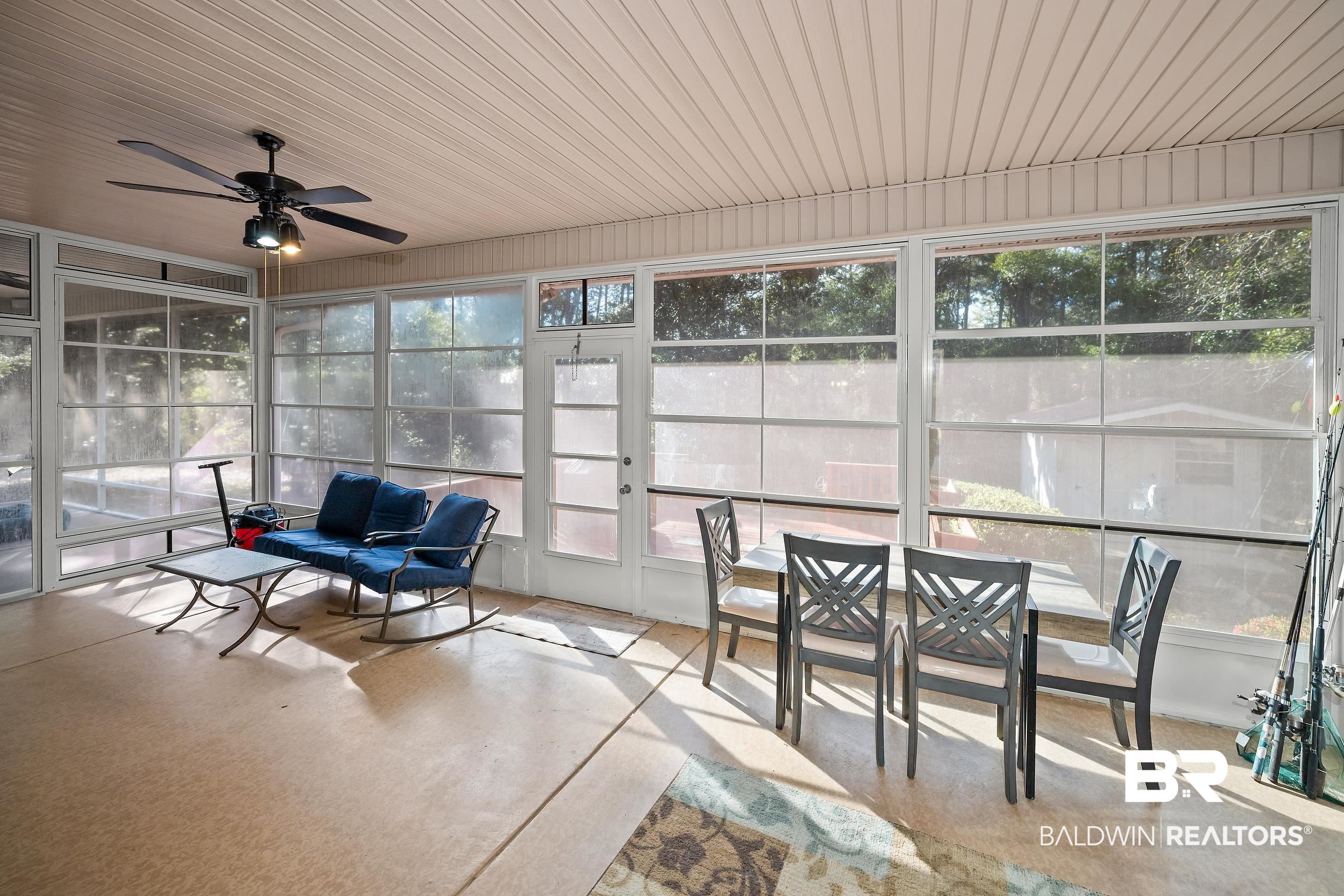 2674 Pine Ridge Drive Lillian, AL 36549 - Photo 21 of 42 Sunroom with ceiling fan