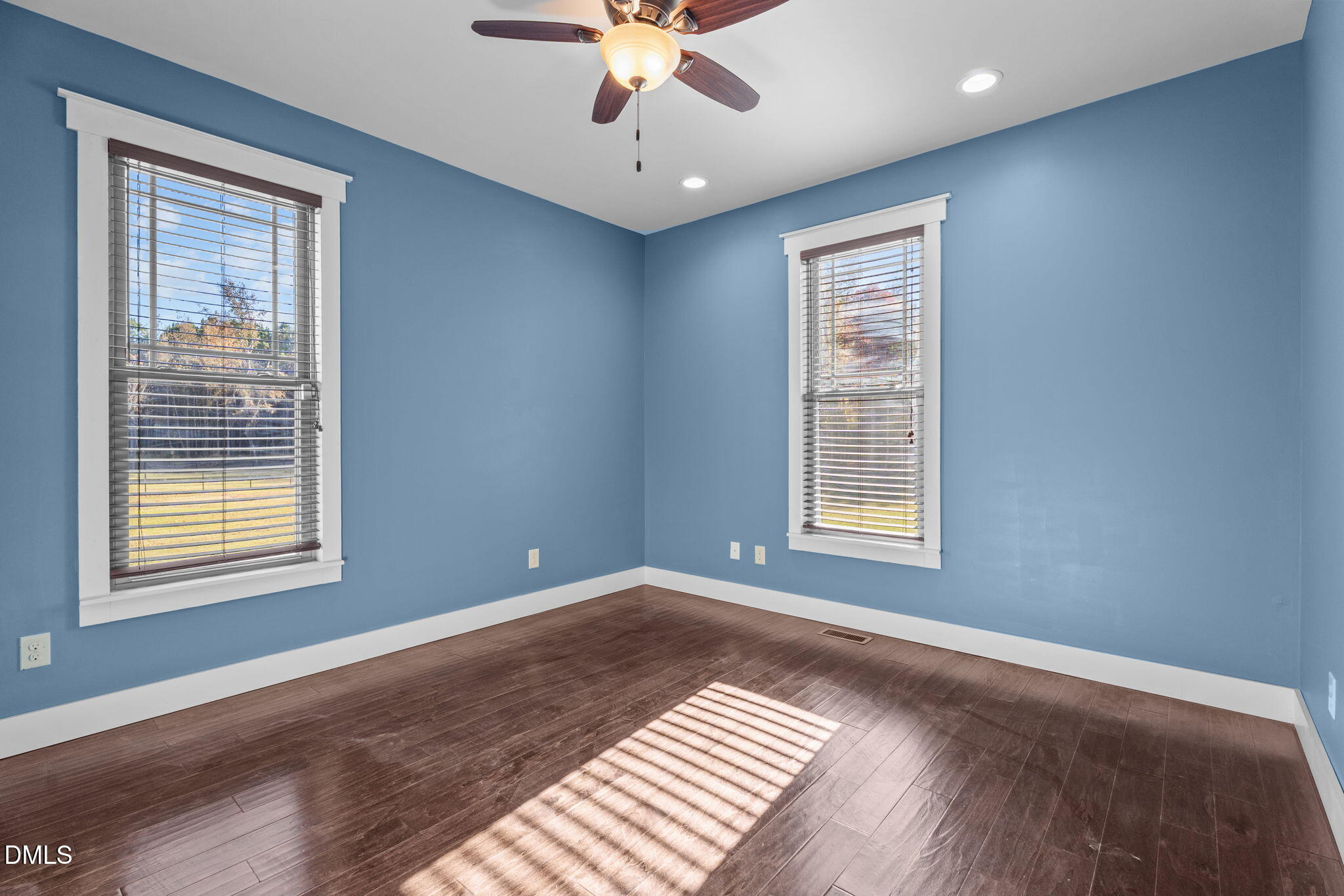 6559 Dolphus Lane Sims, NC 27880 - Photo 20 of 43 a view of an empty room with a window and wooden floor
