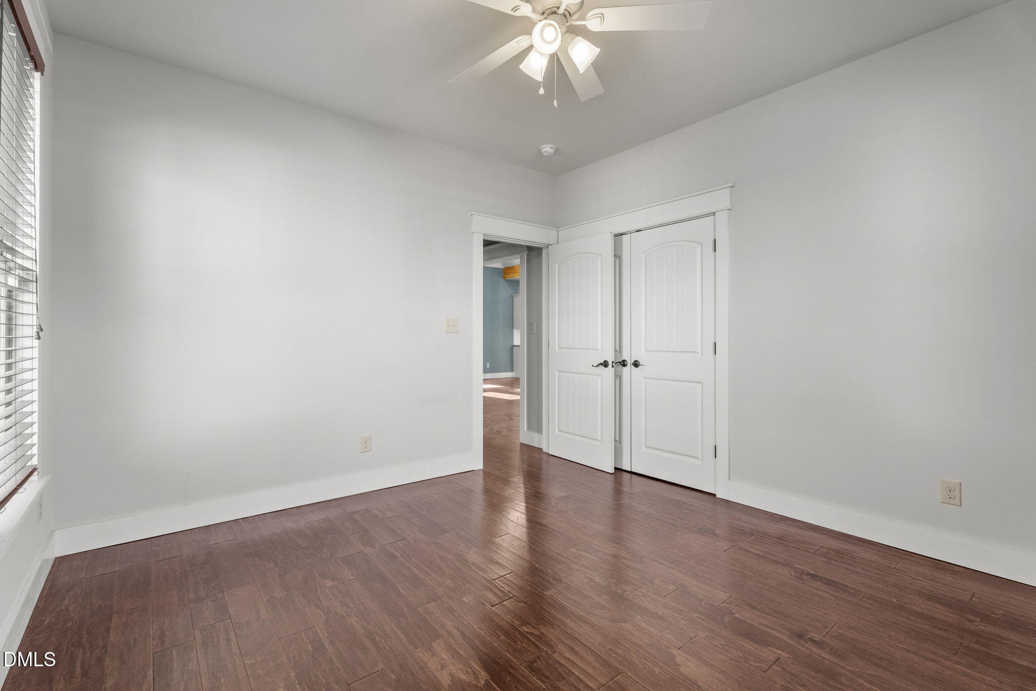 6559 Dolphus Lane Sims, NC 27880 - Photo 25 of 43 an empty room with wooden floor and windows