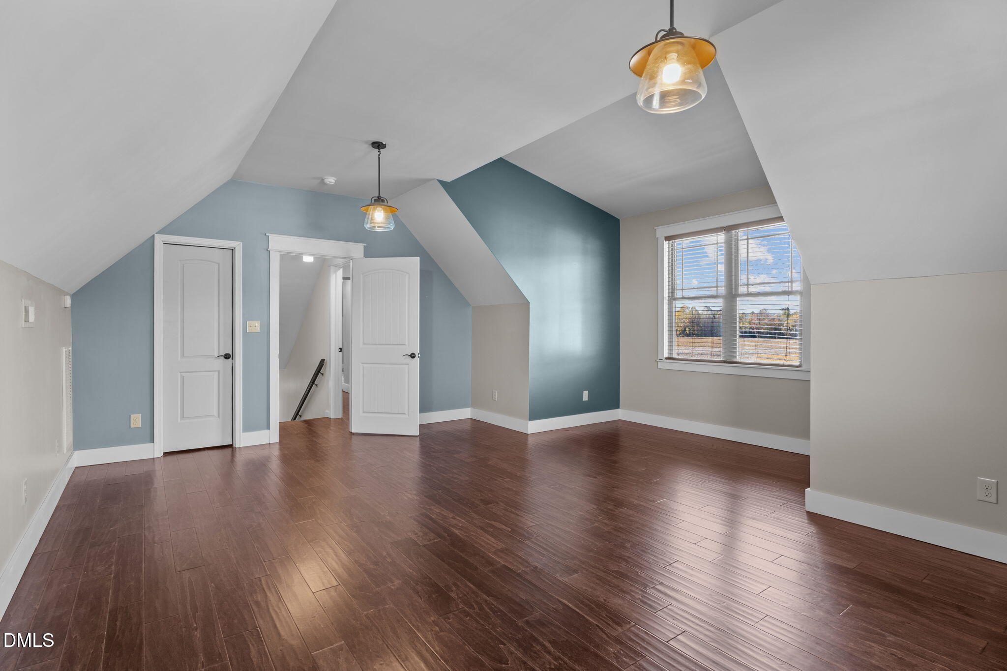 6559 Dolphus Lane Sims, NC 27880 - Photo 32 of 43 a view of an empty room with wooden floor and a window
