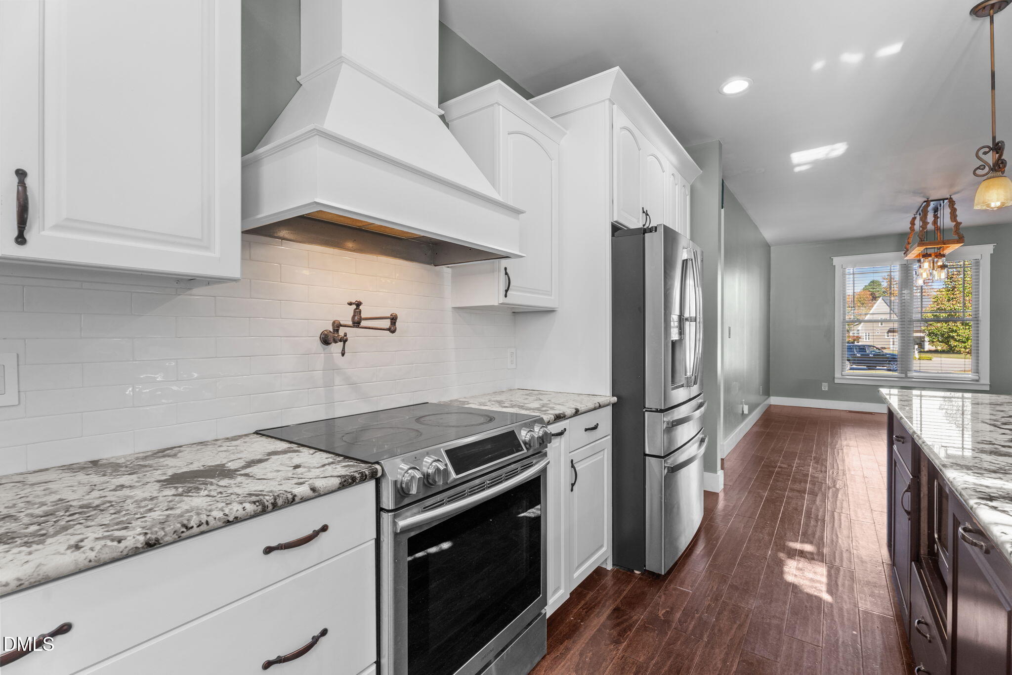6559 Dolphus Lane Sims, NC 27880 - Photo 10 of 43 a kitchen with stainless steel appliances granite countertop a stove a refrigerator and a refrigerator