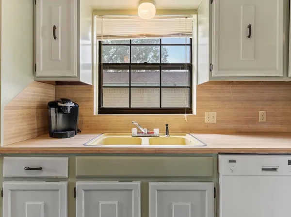 a workspace with furniture and window