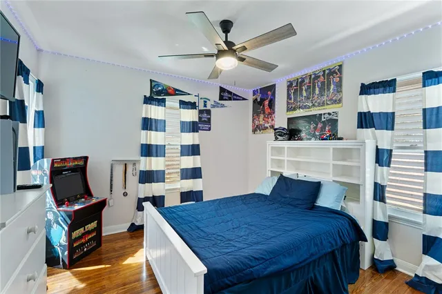 a bedroom with a bed and furniture