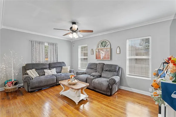a living room with furniture and a window
