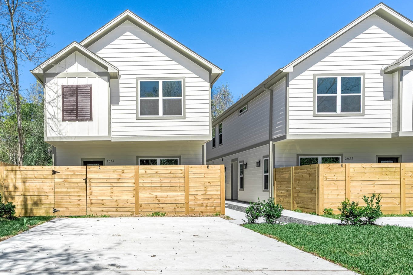 2024 Hampton Street, Unit A B Houston, TX 77088 - Photo 1 of 31 a front view of a house with a yard