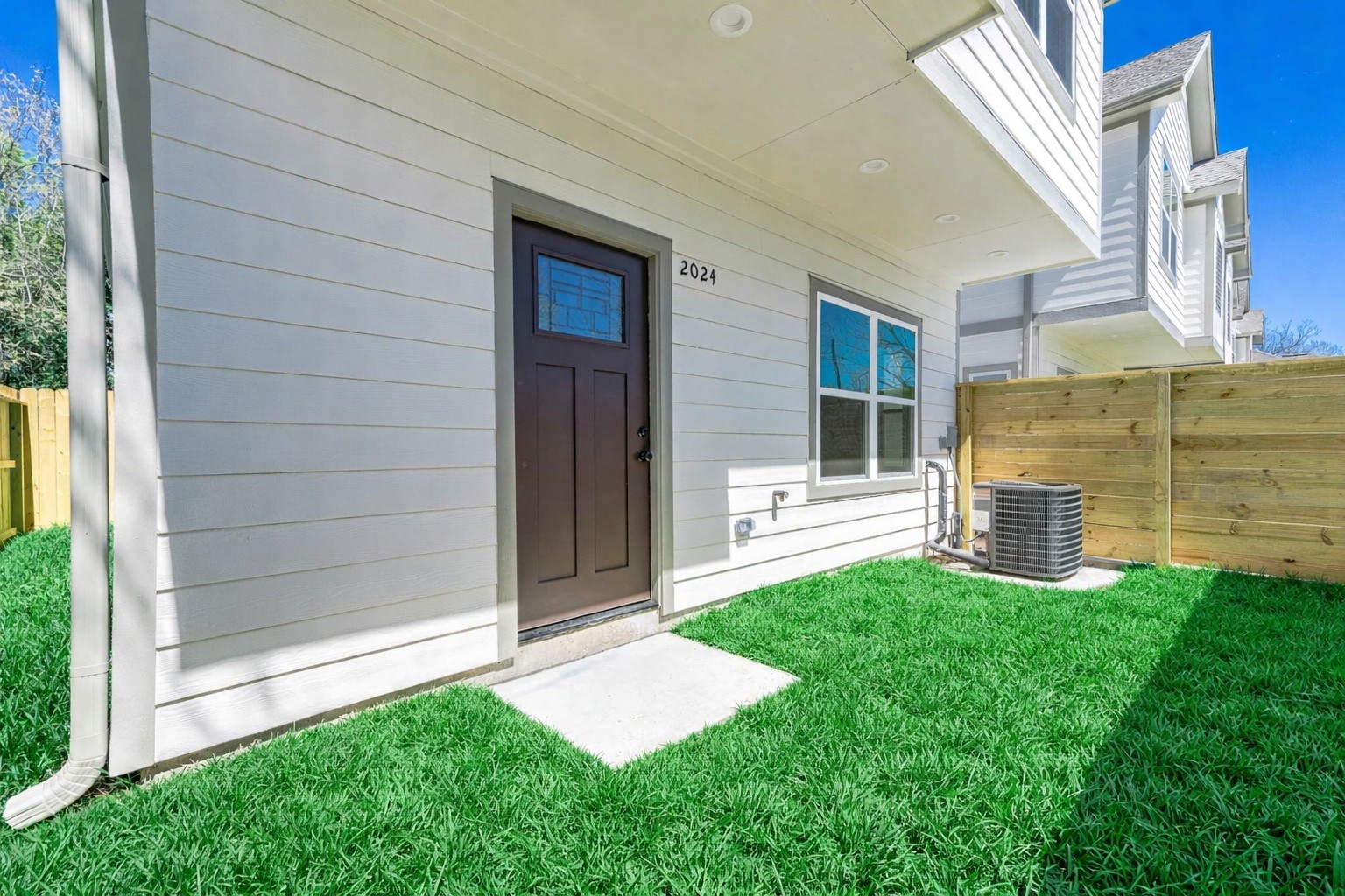 2024 Hampton Street, Unit A B Houston, TX 77088 - Photo 27 of 31 a view of a back yard of the house