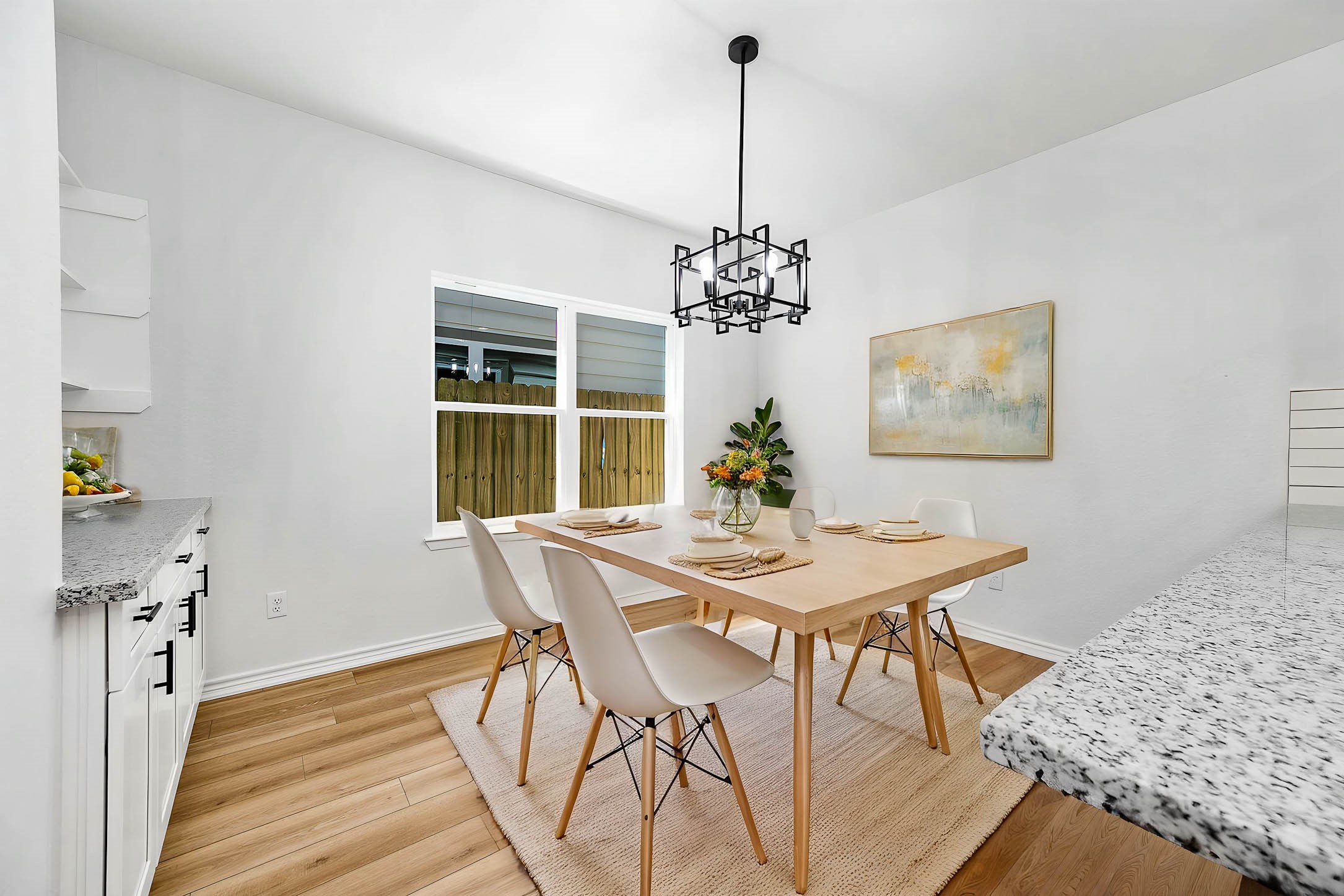 2024 Hampton Street, Unit A B Houston, TX 77088 - Photo 3 of 31 a view of a dining room with furniture and wooden floor