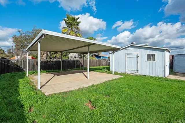 a view of a yard in front of a house