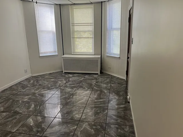 a kitchen with stainless steel appliances granite countertop a stove a microwave and a sink