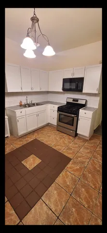 a view of a bathroom with shower