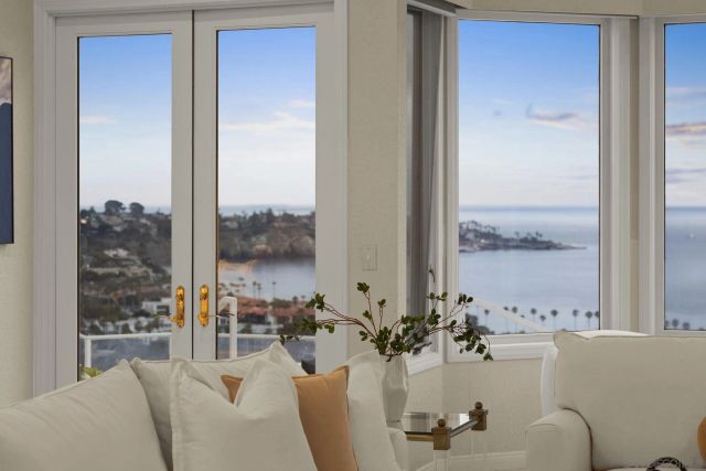 a view of a living room and dining room