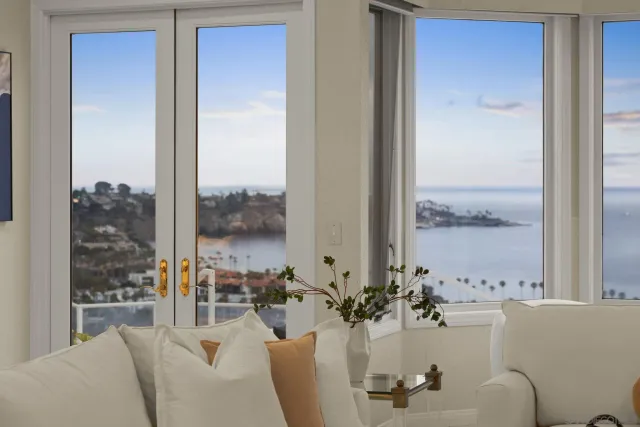 a view of a living room and dining room