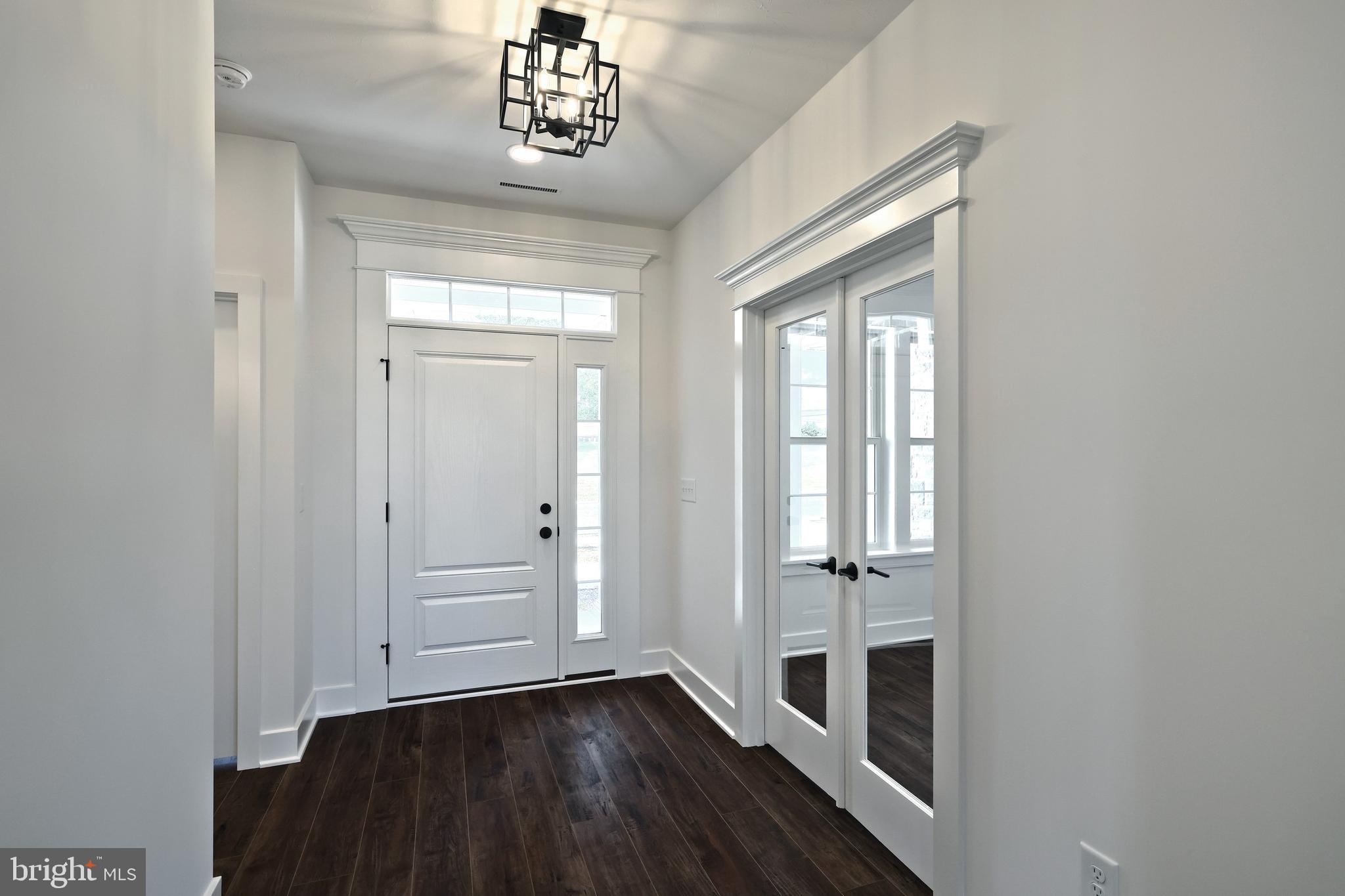 559 Lumber Street Littlestown, PA 17340 - Photo 11 of 73 wooden floor in an empty room with a window