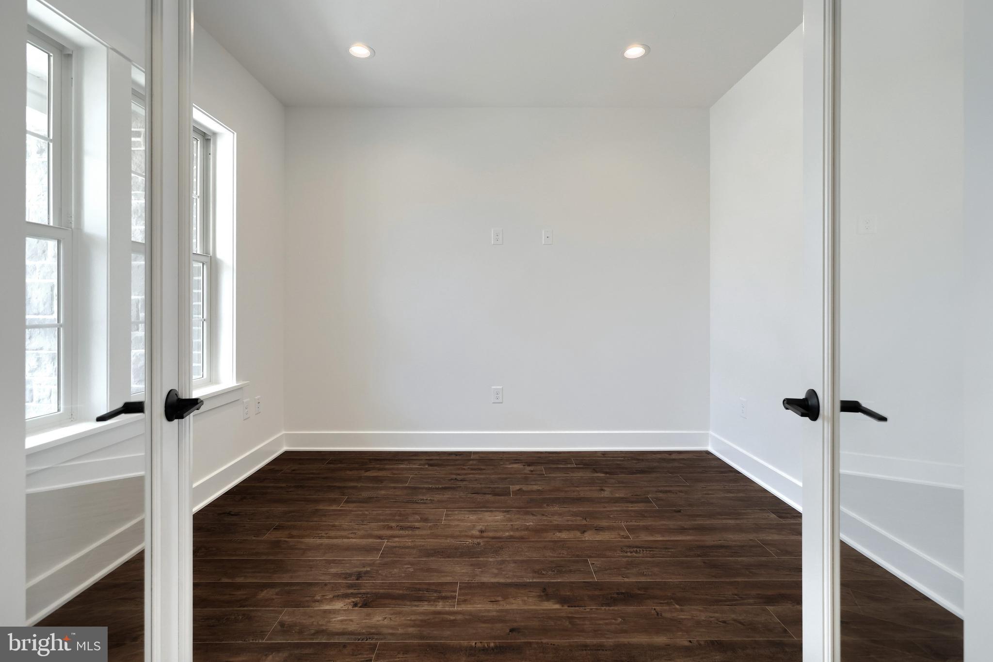 559 Lumber Street Littlestown, PA 17340 - Photo 12 of 73 a view of an empty room with wooden floor and a window