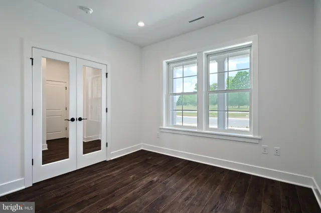 a bathroom with a shower and a bath tub