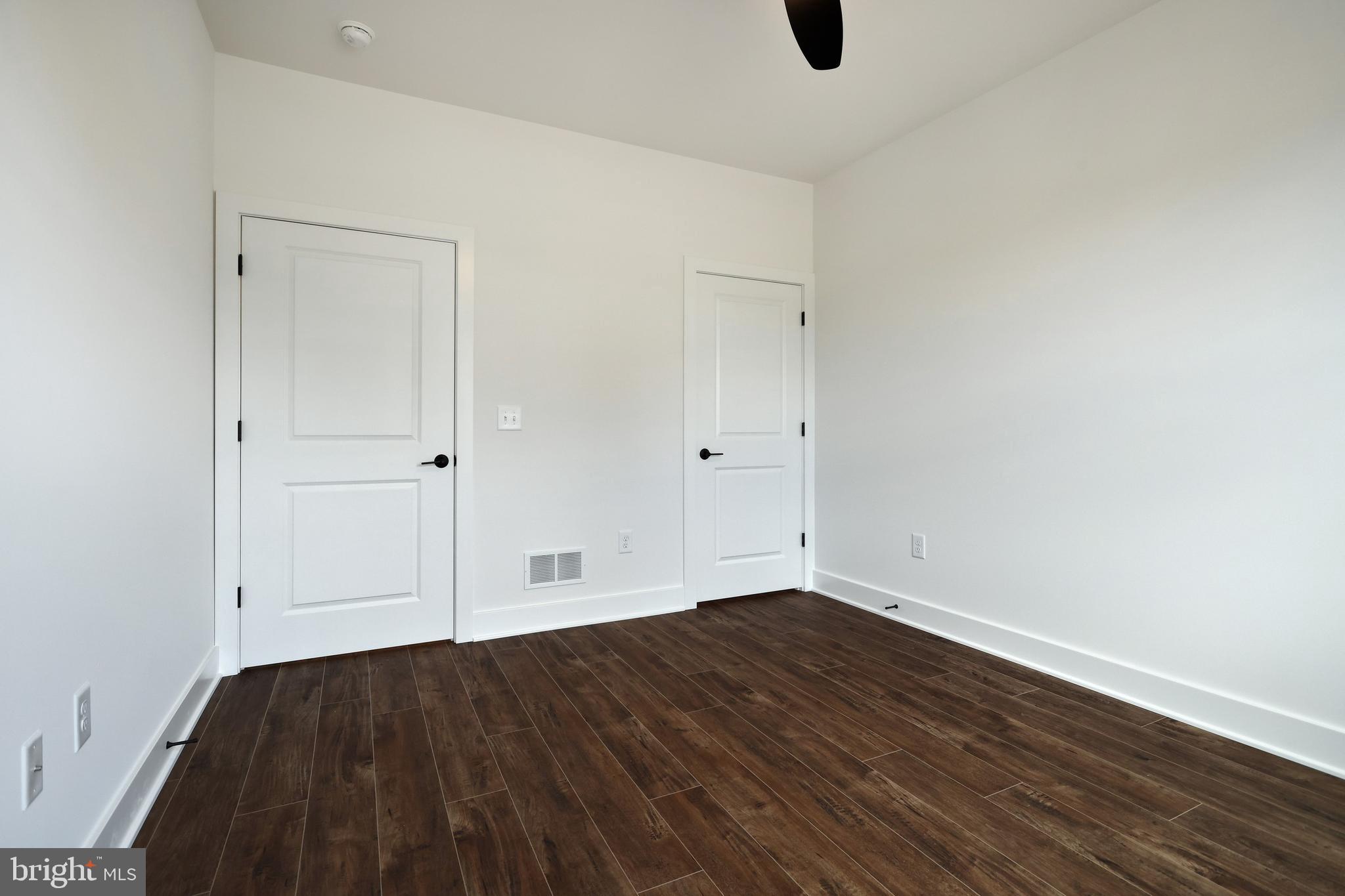 559 Lumber Street Littlestown, PA 17340 - Photo 17 of 73 a view of an empty room with wooden floor