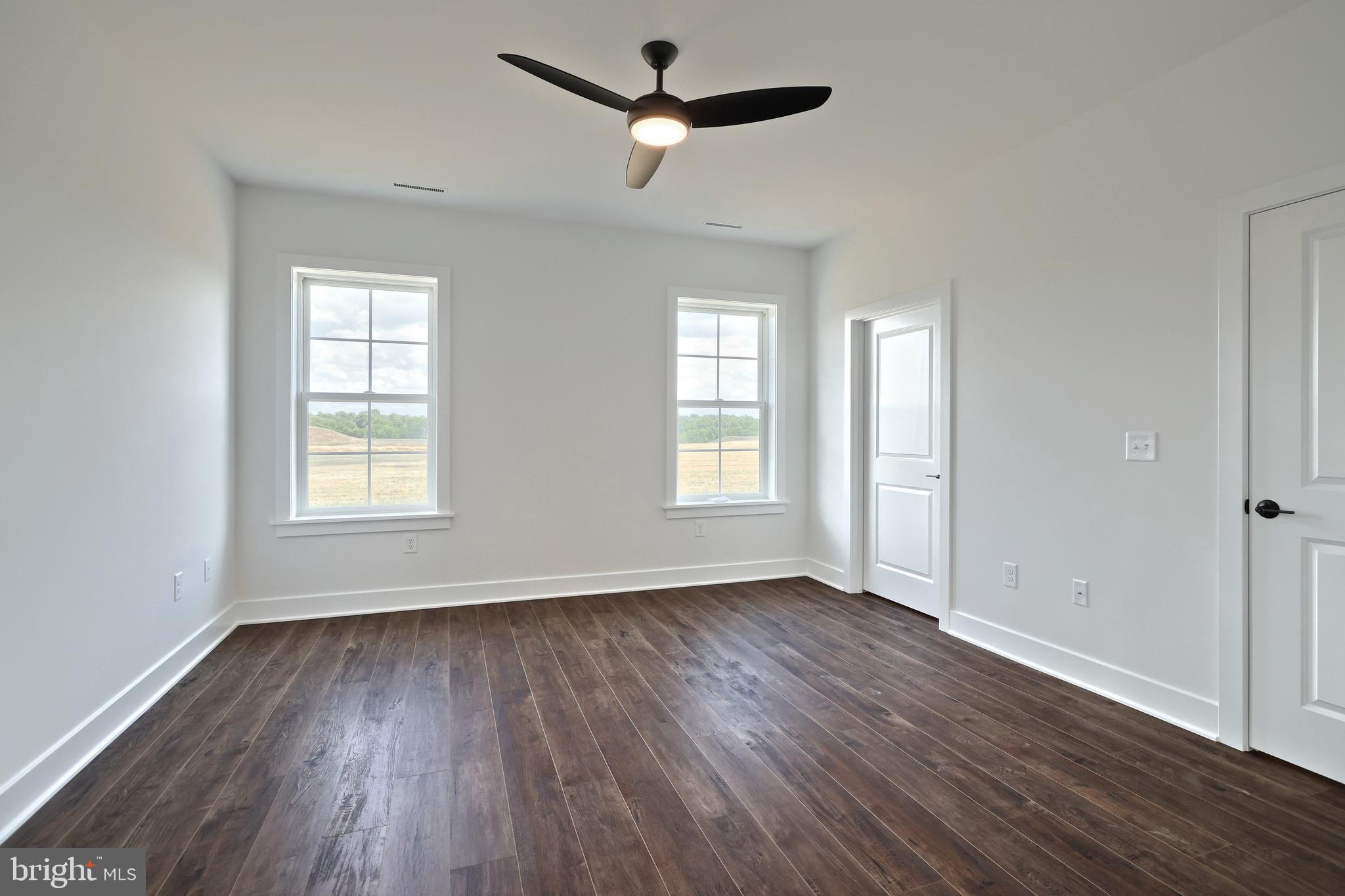 559 Lumber Street Littlestown, PA 17340 - Photo 34 of 73 a view of empty room with wooden floor and fan