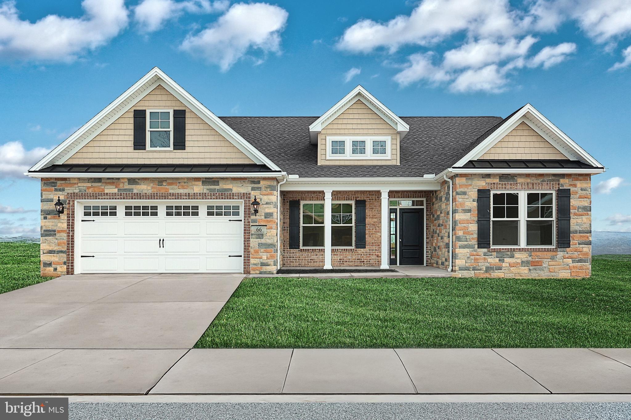 559 Lumber Street Littlestown, PA 17340 - Photo 66 of 73 a front view of a house with a yard and garage