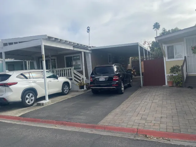 a car parked in front of a house